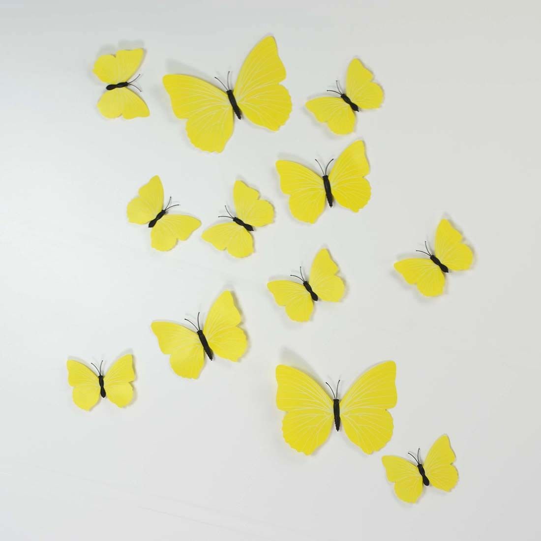 3D žlutí motýli